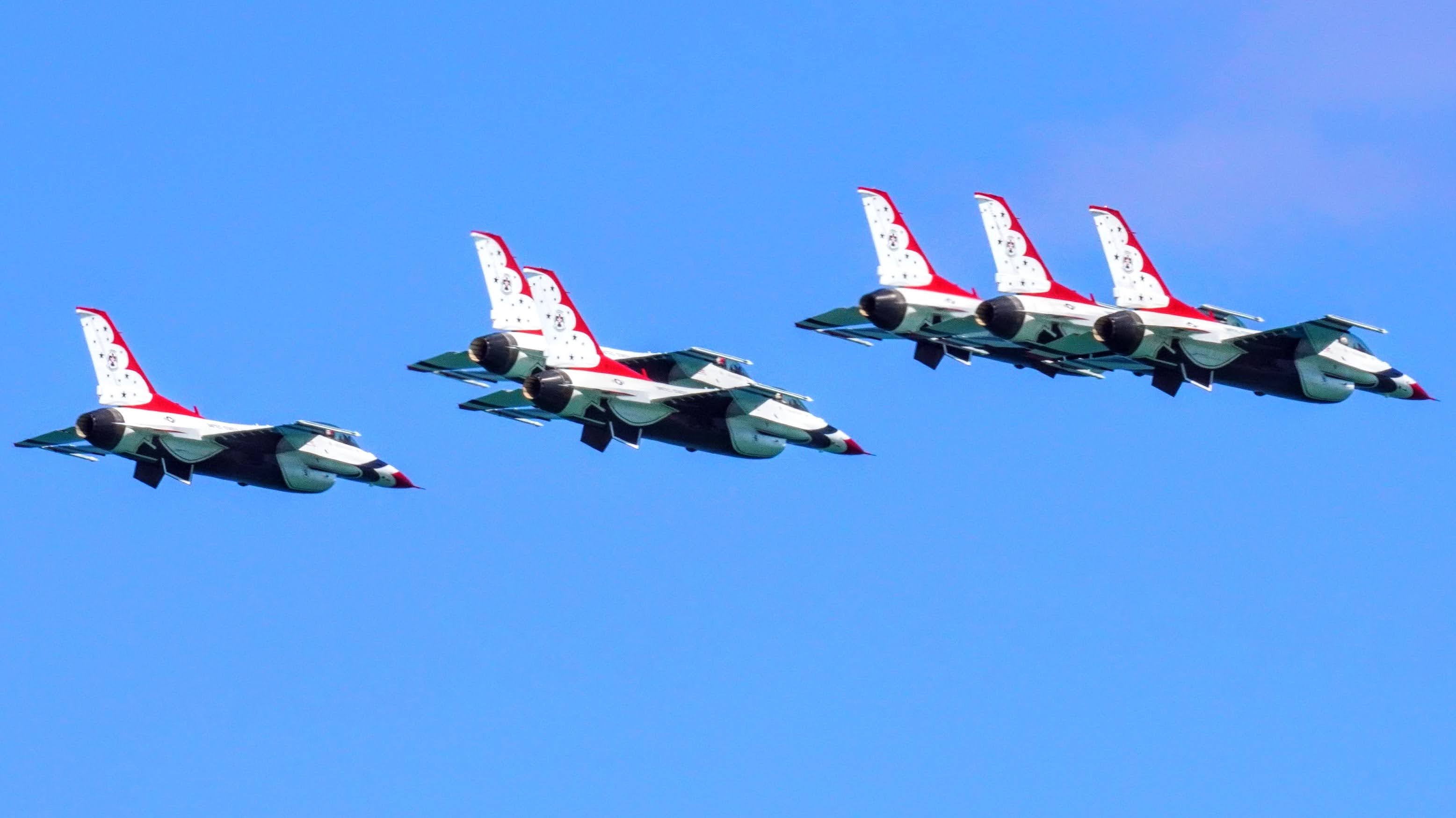 The US Air Force Thunderbirds fly past with a view of six of the planes.